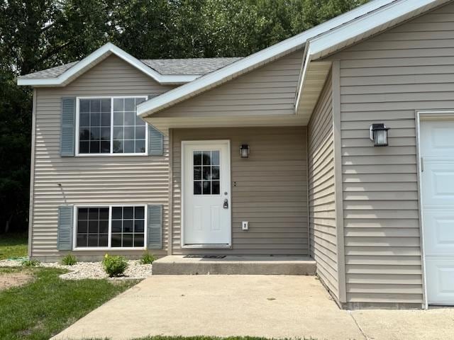 1312 Natures Trl, Alexandria, MN 56308 - view of exterior entry featuring a garage