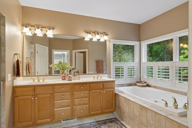 100 River Bluff Pl NW, Rochester, MN 55901 - bathroom with a garden tub, double vanity, and tile patterned floors