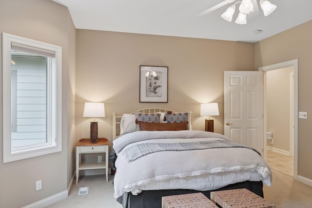100 River Bluff Pl NW, Rochester, MN 55901 - bedroom featuring light colored carpet and ceiling fan