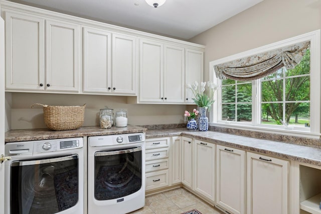 100 River Bluff Pl NW, Rochester, MN 55901 - laundry area featuring washing machine and clothes dryer, cabinet space, and light tile patterned floors