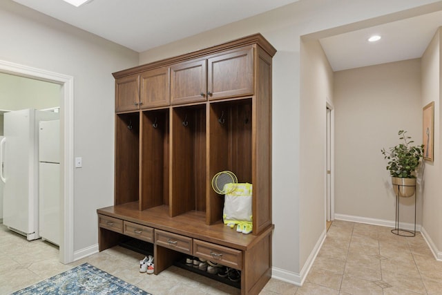 100 River Bluff Pl NW, Rochester, MN 55901 - mudroom with light tile patterned flooring and recessed lighting