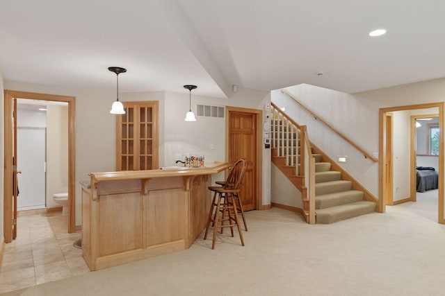 100 River Bluff Pl NW, Rochester, MN 55901 - indoor wet bar with stairway, recessed lighting, pendant lighting, and light carpet