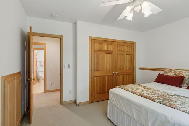100 River Bluff Pl NW, Rochester, MN 55901 - bedroom with light colored carpet, a closet, and a ceiling fan