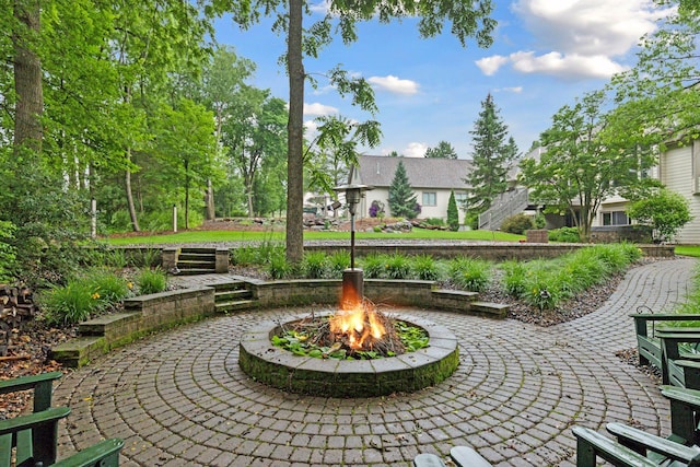 100 River Bluff Pl NW, Rochester, MN 55901 - view of patio featuring a fire pit