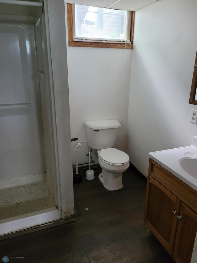 1140 19th St N, Fargo, ND 58102 - bathroom with a stall shower, vanity, and wood finished floors