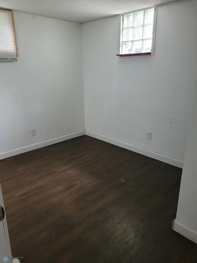 1140 19th St N, Fargo, ND 58102 - basement featuring dark wood finished floors and baseboards