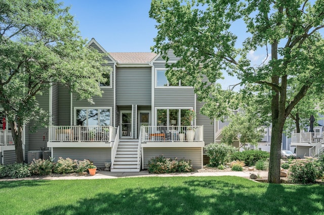 1575 Wayzata Blvd Unit A, Long Lake, MN 55356 - back of house with stairs and a yard