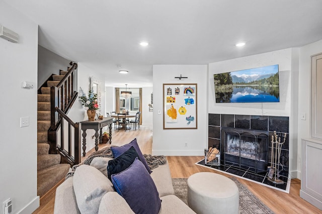 1575 Wayzata Blvd Unit A, Long Lake, MN 55356 - living area with stairs, wood finished floors, recessed lighting, and a fireplace