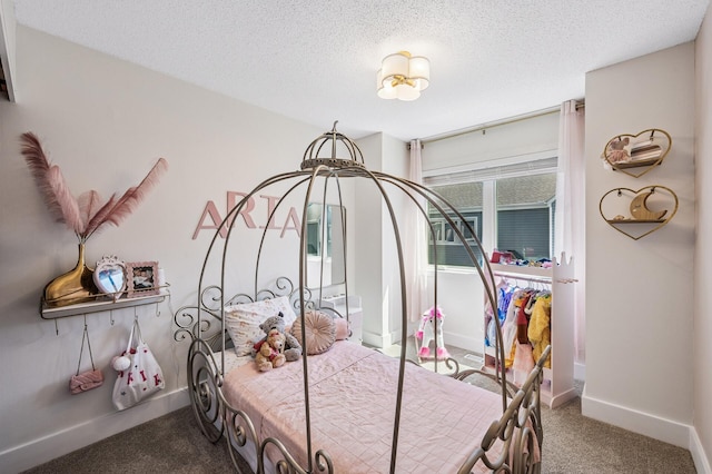 1575 Wayzata Blvd Unit A, Long Lake, MN 55356 - carpeted bedroom featuring baseboards and a textured ceiling