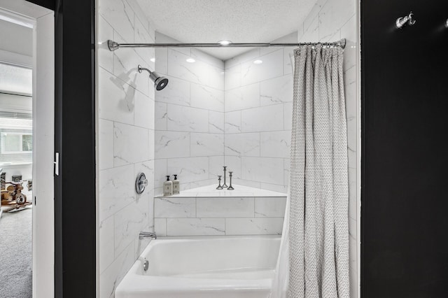 1575 Wayzata Blvd Unit A, Long Lake, MN 55356 - bathroom with shower / tub combo with curtain and a textured ceiling