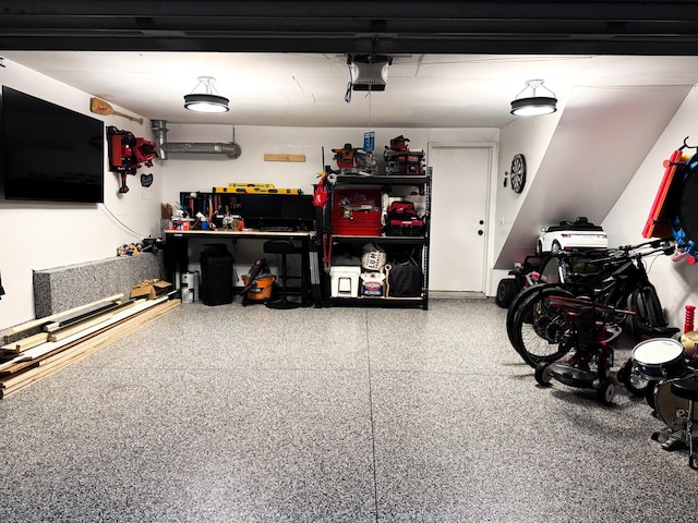 1575 Wayzata Blvd Unit A, Long Lake, MN 55356 - garage with a workshop area and a garage door opener