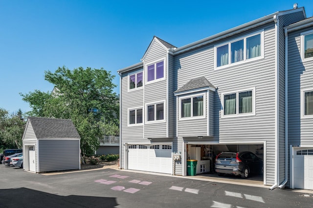 1575 Wayzata Blvd Unit A, Long Lake, MN 55356 - view of side of home featuring an attached garage