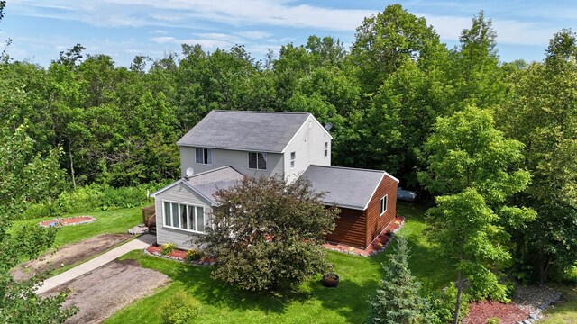 18611 327th Ave, Isle, MN 56342 - view from above of property with a heavily wooded area
