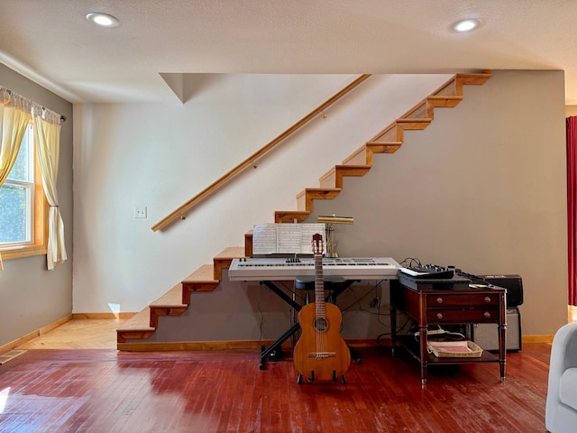 18611 327th Ave, Isle, MN 56342 - stairs featuring hardwood / wood-style flooring and recessed lighting