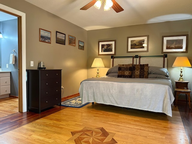 18611 327th Ave, Isle, MN 56342 - bedroom with light wood finished floors and ceiling fan