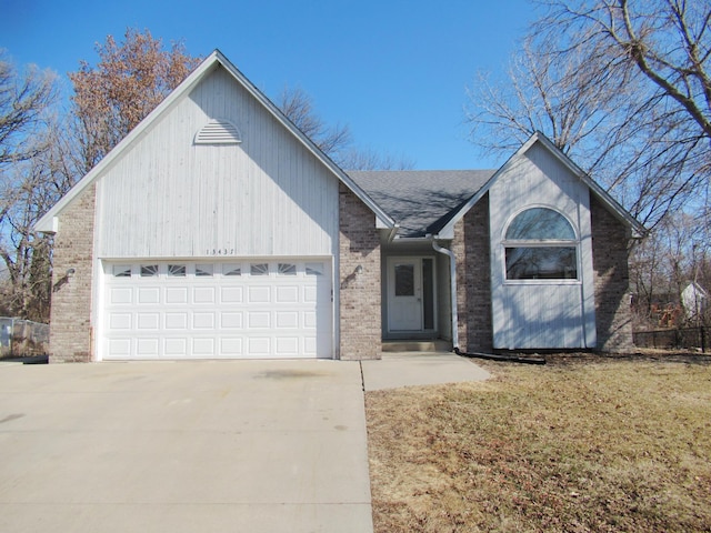 13437 Zarthan Ave S, Savage, MN 55378 - single story home with driveway, a garage, brick siding, a shingled roof, and a front yard