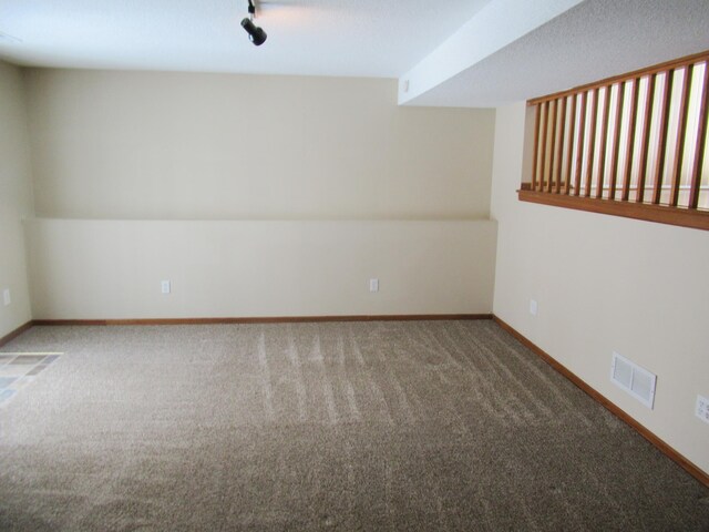 13437 Zarthan Ave S, Savage, MN 55378 - empty room featuring carpet and track lighting