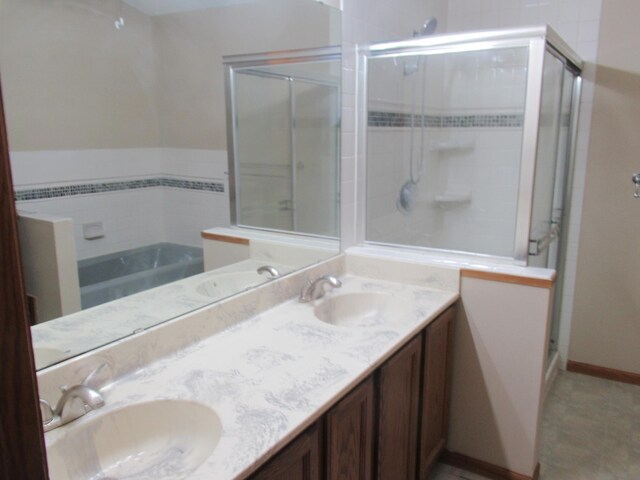 13437 Zarthan Ave S, Savage, MN 55378 - bathroom with a shower stall, double vanity, and a tub