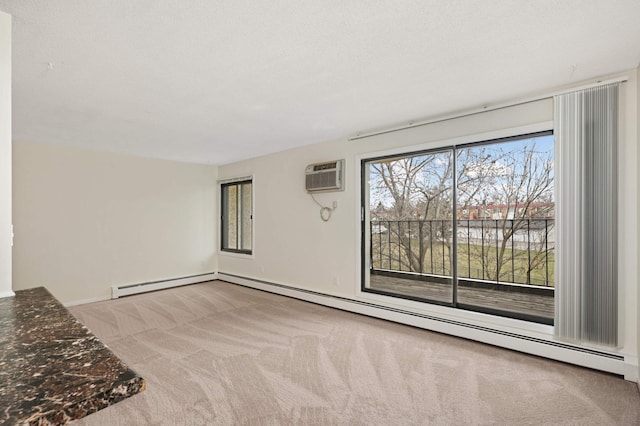 4130 Rahn Rd Unit 310, Eagan, MN 55122 - carpeted empty room with a wall mounted air conditioner and a baseboard radiator