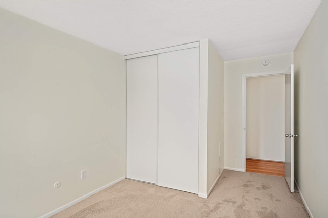 4130 Rahn Rd Unit 310, Eagan, MN 55122 - unfurnished bedroom with light colored carpet and a closet