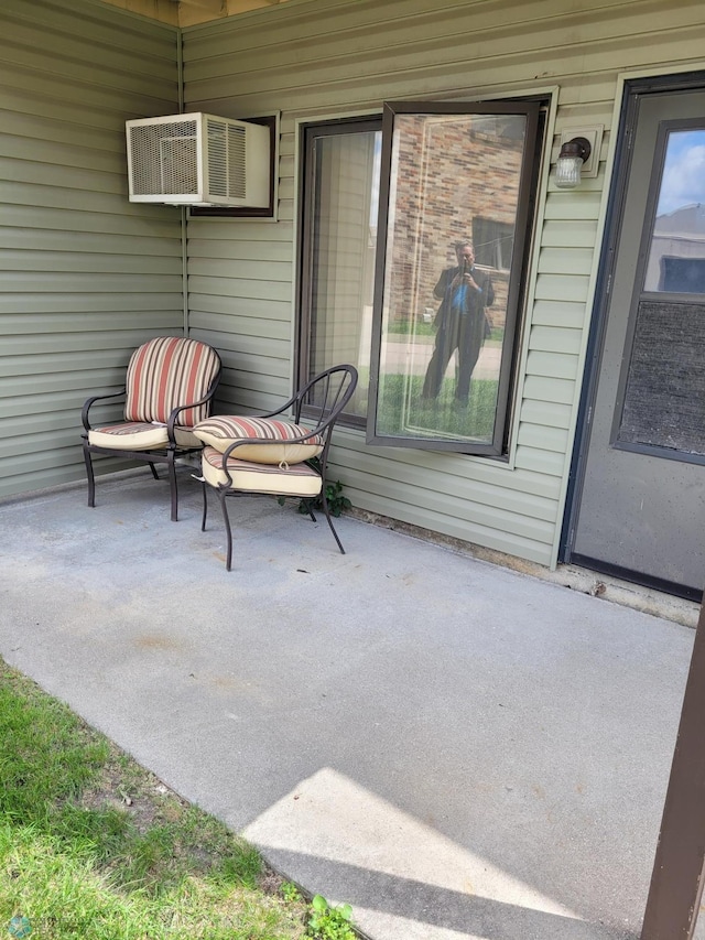 2402 18th St S Unit 3, Fargo, ND 58103 - view of patio with a wall mounted air conditioner