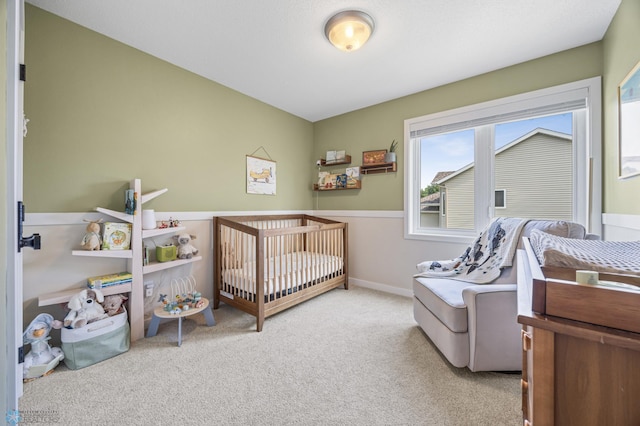 421 2nd Ave S, Kindred, ND 58051 - bedroom with carpet flooring and a nursery area