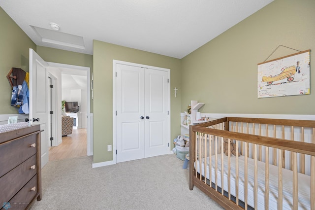 421 2nd Ave S, Kindred, ND 58051 - carpeted bedroom with a closet and attic access