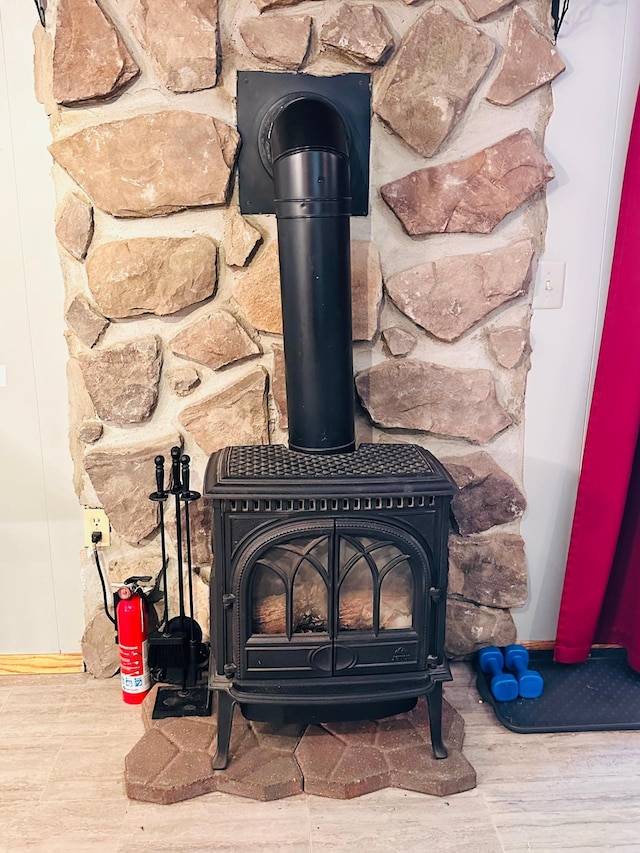1414 E Shore Dr, Edgewater, WI 54817 - detailed view of a wood stove and wood finished floors