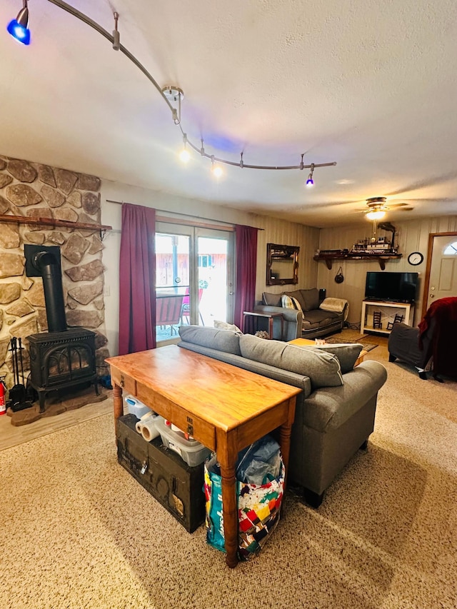 1414 E Shore Dr, Edgewater, WI 54817 - living room with a wood stove and a textured ceiling