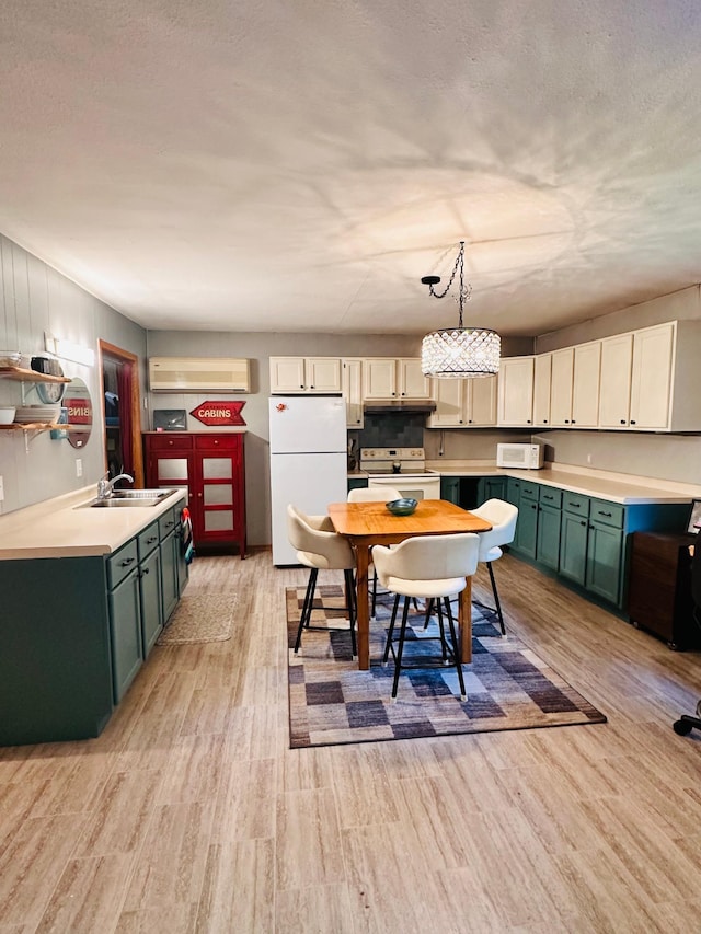 1414 E Shore Dr, Edgewater, WI 54817 - kitchen featuring white appliances, green cabinets, light wood-type flooring, light countertops, and a wall mounted air conditioner