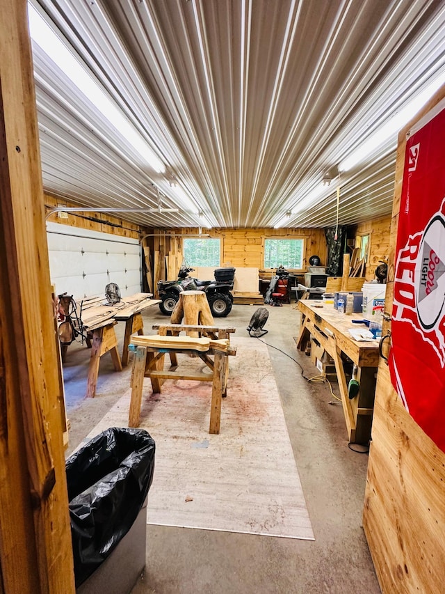 1414 E Shore Dr, Edgewater, WI 54817 - misc room with concrete floors, a workshop area, and a garage