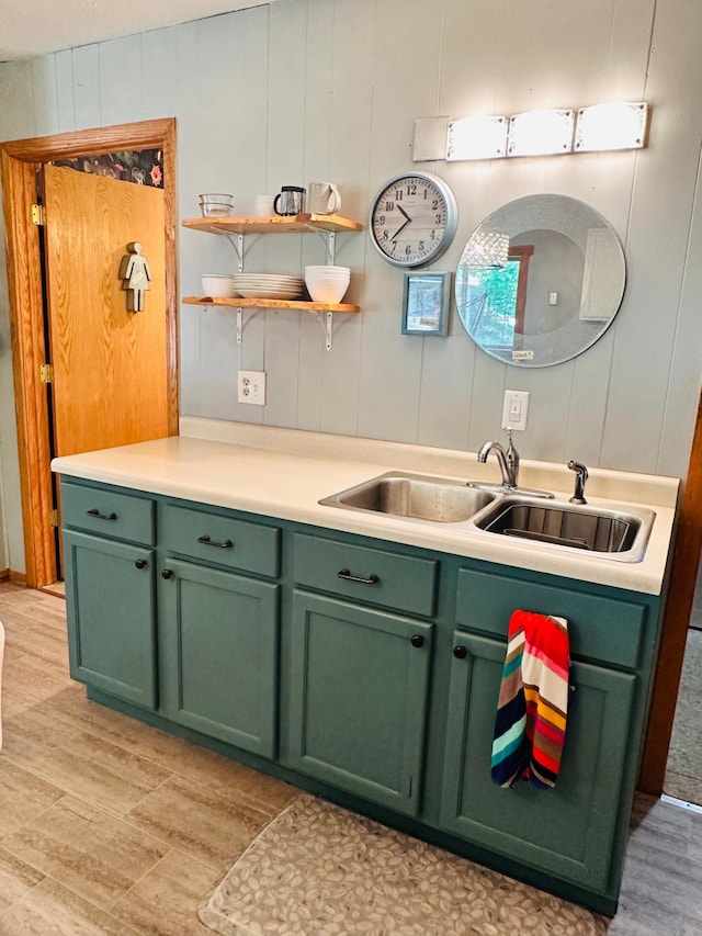1414 E Shore Dr, Edgewater, WI 54817 - kitchen with green cabinets, light wood-type flooring, and light countertops