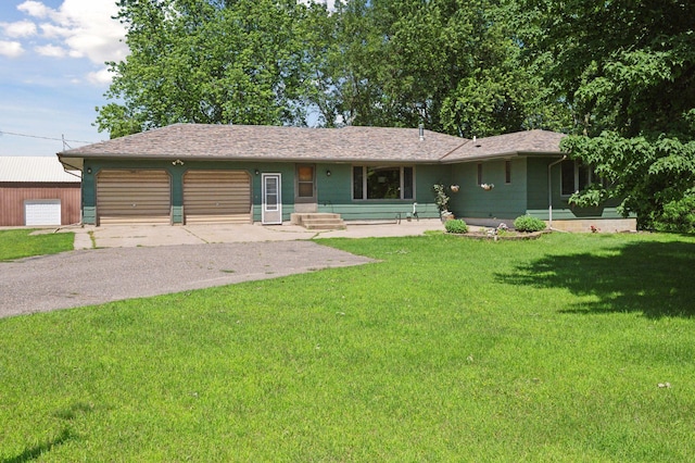 29908 108th St NW, Baldwin Twp, MN 55371 - ranch-style home featuring an attached garage, a front lawn, and asphalt driveway