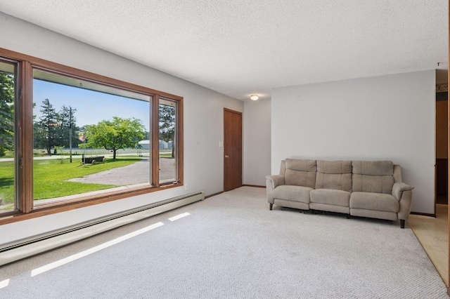 29908 108th St NW, Baldwin Twp, MN 55371 - living area with a baseboard heating unit, a textured ceiling, and light colored carpet