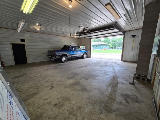 29908 108th St NW, Baldwin Twp, MN 55371 - garage featuring a garage door opener