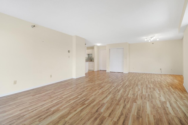 66 9th St E Unit 1315, Saint Paul, MN 55101 - unfurnished room with light wood-type flooring and baseboards