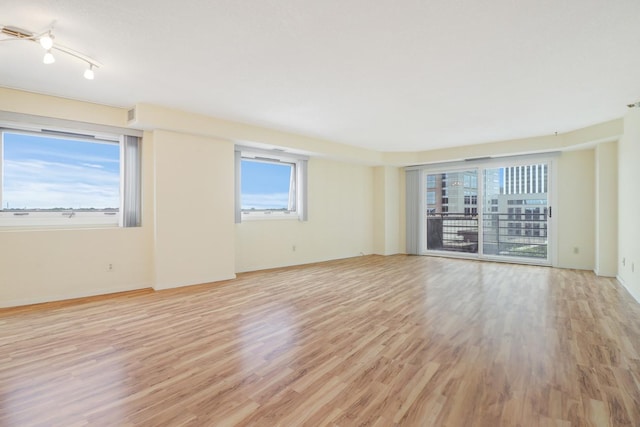 66 9th St E Unit 1315, Saint Paul, MN 55101 - unfurnished room with light wood finished floors