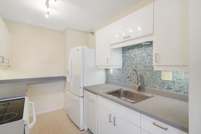 66 9th St E Unit 1315, Saint Paul, MN 55101 - kitchen featuring white appliances, white cabinetry, tasteful backsplash, and track lighting