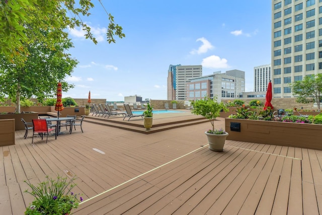66 9th St E Unit 1315, Saint Paul, MN 55101 - deck with a view of city, a community pool, and outdoor dining space