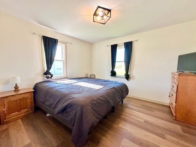 1555 US Highway 75, Lake Benton Twp, MN 56149 - bedroom featuring light wood-style flooring and baseboards