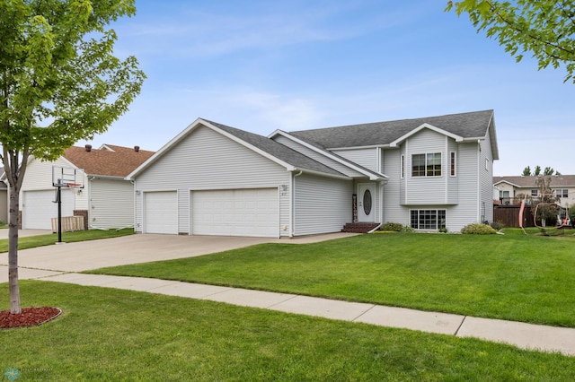 817 16th Avenue Ct W, West Fargo, ND 58078 - tri-level home with a garage, concrete driveway, and roof with shingles