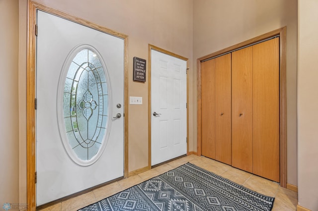 817 16th Avenue Ct W, West Fargo, ND 58078 - foyer entrance with light tile patterned flooring and baseboards