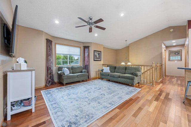 817 16th Avenue Ct W, West Fargo, ND 58078 - living room featuring a ceiling fan, light wood-type flooring, vaulted ceiling, and recessed lighting