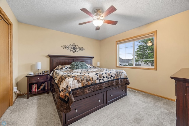 817 16th Avenue Ct W, West Fargo, ND 58078 - bedroom featuring light carpet, ceiling fan, and a textured ceiling