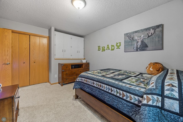 817 16th Avenue Ct W, West Fargo, ND 58078 - bedroom with a textured ceiling, light carpet, and a closet