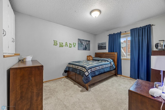 817 16th Avenue Ct W, West Fargo, ND 58078 - bedroom featuring carpet flooring and a textured ceiling