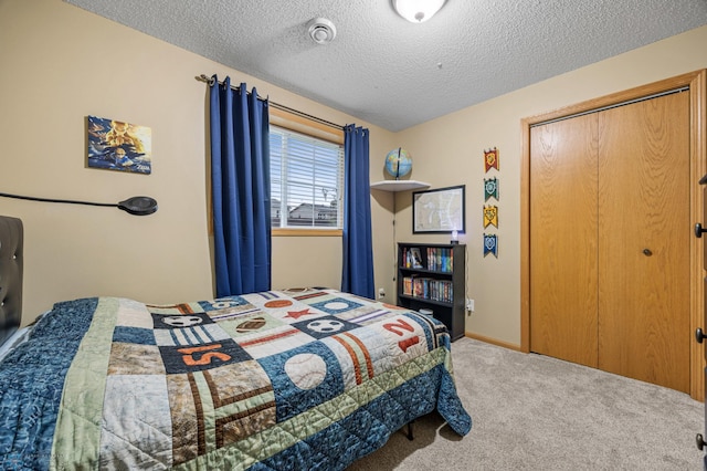 817 16th Avenue Ct W, West Fargo, ND 58078 - carpeted bedroom featuring a textured ceiling and a closet