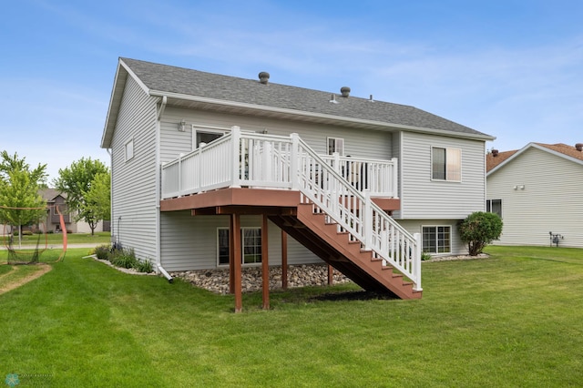 817 16th Avenue Ct W, West Fargo, ND 58078 - rear view of house with stairway, a deck, a lawn, and roof with shingles