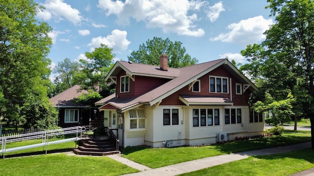 221 3rd St, Moose Lake, MN 55767 - view of front of house featuring a chimney and roof with shingles