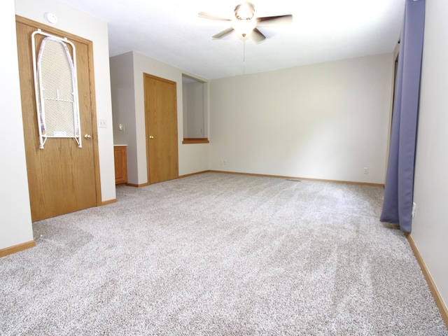 237 Plainview Dr, Troy Twp, WI 54022 - carpeted spare room with a ceiling fan and baseboards